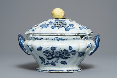 A Dutch Delft blue and white soup tureen with reticulated apple-topped cover, 18th C.