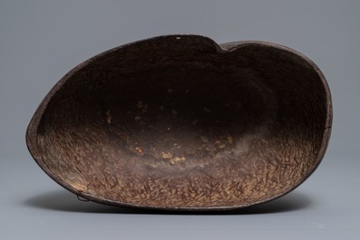 An islamic carved coco-de-mer 'kashkul' beggar's bowl, Qajar, Iran, 19th C.