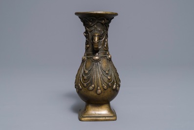 A Sino-Tibetan silver-inlaid bronze vase, 18/19th C.