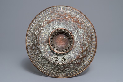 A pierced and engraved brass bowl, Spain or Italy, 17th C.