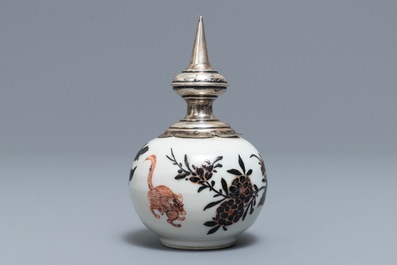A Chinese iron red and overglaze black silver-mounted vase, 19th C.