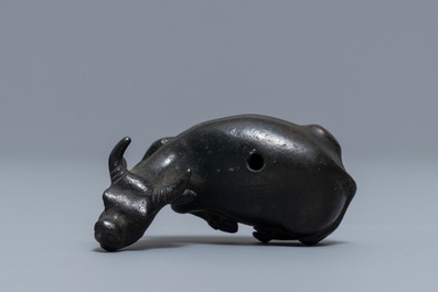 A Chinese bronze water dropper in the shape of a buffalo, two-character mark, Ming