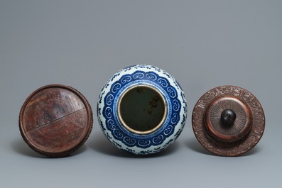 A Chinese blue and white 'aster' dish and a 'peony scroll' vase, Kangxi and 19th C.