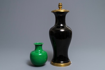 Two Chinese monochrome green and black vases, 18/19th C.