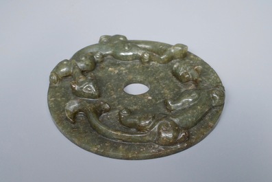 A Chinese dark green jade bi disc with chilong, 19/20th C.