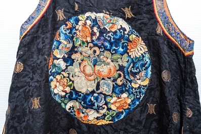 Two Chinese embroidered silk woman&rsquo;s clothes, 19th C.