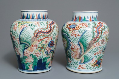 A pair of Chinese wucai &lsquo;dragon and phoenix&rsquo; vases, Transitional period