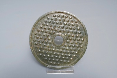A Chinese dark green jade bi disc with chilong, 19/20th C.
