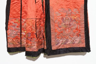 Two Chinese embroidered silk woman&rsquo;s clothes, 19th C.