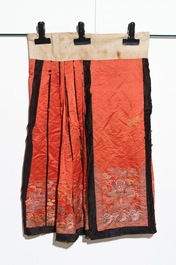 Two Chinese embroidered silk woman&rsquo;s clothes, 19th C.