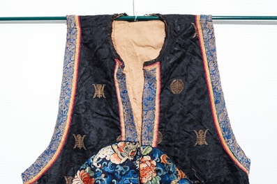 Two Chinese embroidered silk woman&rsquo;s clothes, 19th C.