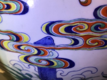 Un vase imp&eacute;rial en porcelaine de Chine doucai &agrave; d&eacute;cor de dragons, marque et &eacute;poque de Qianlong