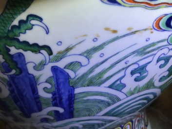 Un vase imp&eacute;rial en porcelaine de Chine doucai &agrave; d&eacute;cor de dragons, marque et &eacute;poque de Qianlong