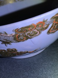 A Chinese gilt-decorated relief-moulded 'dragons and carps' bowl, Kangxi/Yongzheng