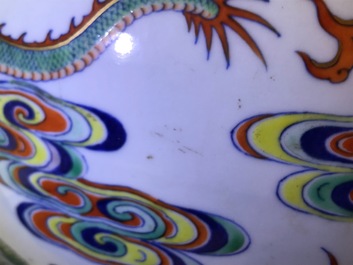 Un vase imp&eacute;rial en porcelaine de Chine doucai &agrave; d&eacute;cor de dragons, marque et &eacute;poque de Qianlong