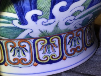 Un vase imp&eacute;rial en porcelaine de Chine doucai &agrave; d&eacute;cor de dragons, marque et &eacute;poque de Qianlong