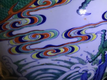 Un vase imp&eacute;rial en porcelaine de Chine doucai &agrave; d&eacute;cor de dragons, marque et &eacute;poque de Qianlong