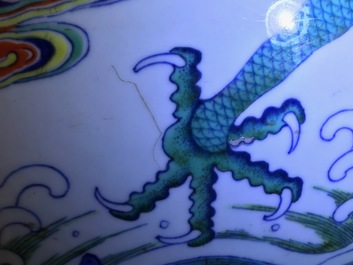 Un vase imp&eacute;rial en porcelaine de Chine doucai &agrave; d&eacute;cor de dragons, marque et &eacute;poque de Qianlong