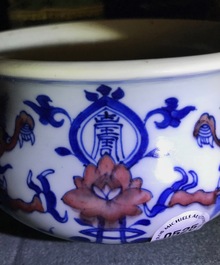 A rare Chinese blue, white and copper red 'dragon' censer, Kangxi