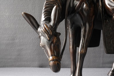 A large Japanese bronze group of a sage on horseback, Meiji, 19th C.