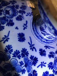 A pair of Dutch Delft blue and white tazza's with floral and ornamental design, 17/18th C.