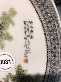 A Chinese fencai plate with figures in a garden, Republic, 20th C.