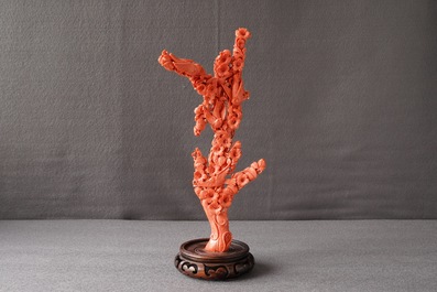 A Chinese red coral carving of a flower branch with birds, 19th C.