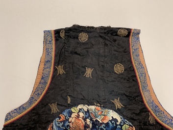 Two Chinese embroidered silk woman&rsquo;s clothes, 19th C.