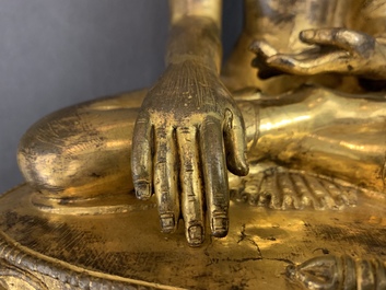 Une figure de Bouddha Shakyamuni en cuivre dor&eacute;, 17/18&egrave;me