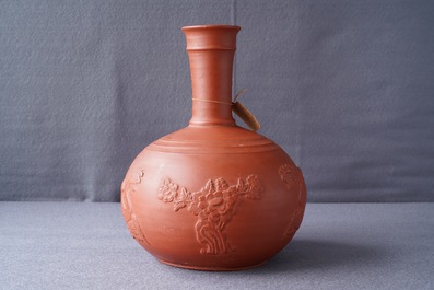 A yixing style red earthenware bottle vase, poss. Dutch Delftware, 18th C.