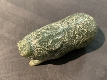 A Chinese jade deer rhyton cup and a spinach green jade pig, Han or later