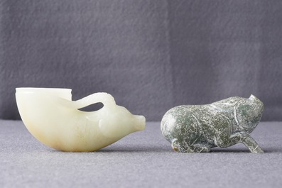 A Chinese jade deer rhyton cup and a spinach green jade pig, Han or later