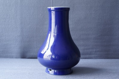 A Chinese monochrome 'sacrifical blue' pear-shaped vase, Yongzheng mark and of the period