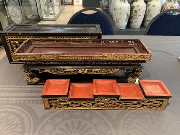 A Chinese Straits or Peranakan market gilded and lacquered wood altar box on stand and a table display, 19th C.