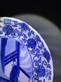 Two Chinese blue and white moulded plates with figures, Kangxi mark and of the period