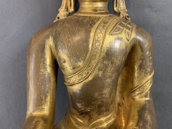 A Sino-Tibetan gilt-copper figure of Buddha Shakyamuni, 17/18th C.