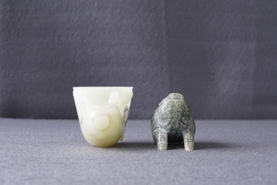 A Chinese jade deer rhyton cup and a spinach green jade pig, Han or later