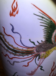 A Chinese famille verte inscribed 'dragon and phoenix' rouleau vase, Kangxi mark and of the period