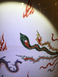 A Chinese famille verte inscribed 'dragon and phoenix' rouleau vase, Kangxi mark and of the period