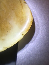 A Chinese russet jade 'Tiger Charm' inscribed pendant, 19/20th C.