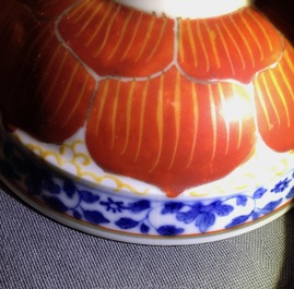 A Chinese blue, white and iron red bowl and cover on stand, Qianlong/Jiaqing