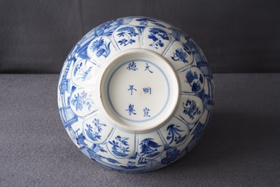 A Chinese blue and white moulded bowl with figurative panels, Xuande mark, Kangxi