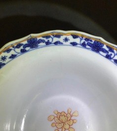 A Chinese blue, white and iron red bowl and cover on stand, Qianlong/Jiaqing