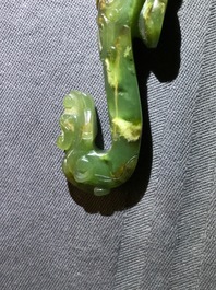 Three Chinese jade belt hooks, 19th C.