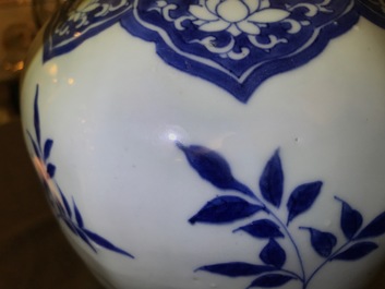A Chinese blue and white covered vase with floral designs, Transitional period