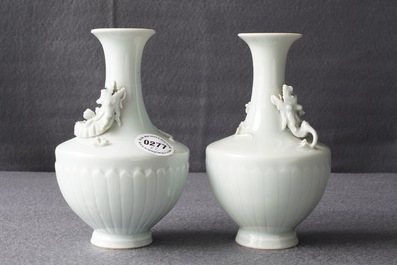 A pair of Chinese ru-style glazed vases with applied qilong, Yongle mark, 19th C.