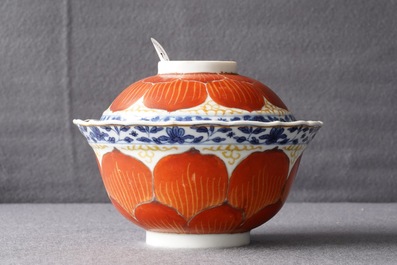 A Chinese blue, white and iron red bowl and cover on stand, Qianlong/Jiaqing