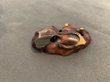 A Chinese jade group of two Mandarin ducks on lotus leaf, 19th C.