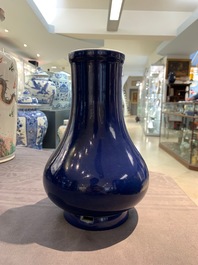 A Chinese monochrome 'sacrifical blue' pear-shaped vase, Yongzheng mark and of the period