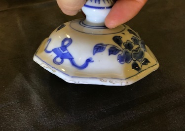 A Chinese blue and white covered vase with birds among flowers, Transitional period